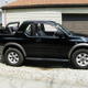 Illustration for article titled For $4,650, This 2002 Isuzu Rodeo Will Flip Its Lid, And That’s No Lie